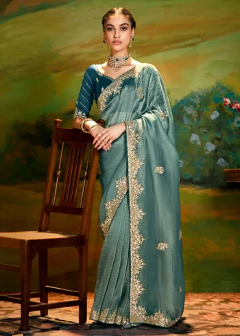 Mint Green Heavy Embroidered Fancy Fabric Designer Saree With contrast Blouse.