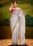 White Heavy Embroidered Fancy Fabric Designer Saree With contrast Blouse.