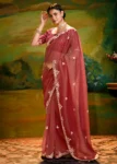 Maroon Heavy Embroidered Fancy Fabric Designer Saree With contrast Blouse.