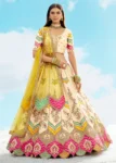 Cream Fancy Silk Fibre Heavy Embroidered Bridal Lehenga Choli Set.