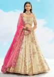 Beige Fancy Silk Fibre Heavy Embroidered Bridal Lehenga Choli Set.