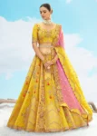 Lime Yellow Fancy Silk Fibre Heavy Embroidered Bridal Lehenga Choli Set.