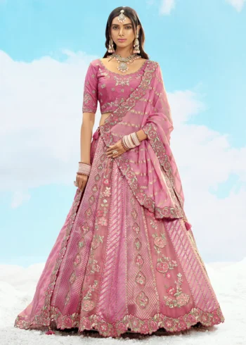 Pink Fancy Silk Fibre Heavy Embroidered Bridal Lehenga Choli Set.