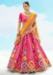 Rani Pink Fancy Silk Fibre Heavy Embroidered Bridal Lehenga Choli Set.