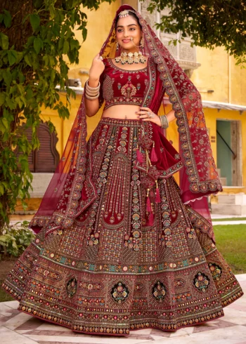 Elegant Traditional Maroon Bridal Lehenga Choli with Intricate Embroidery.