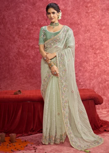 Exquisite Pista Green Fancy Embroidered Wedding Wear Saree